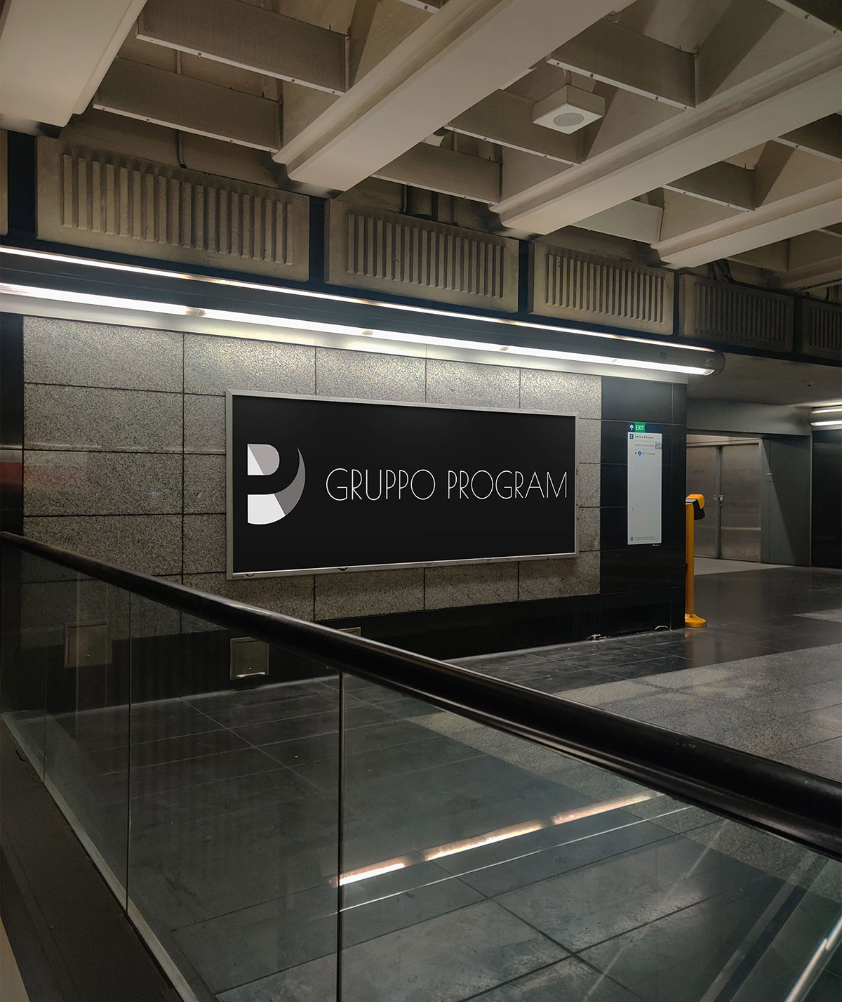 affissione in una metropolitana con logo Gruppo Program